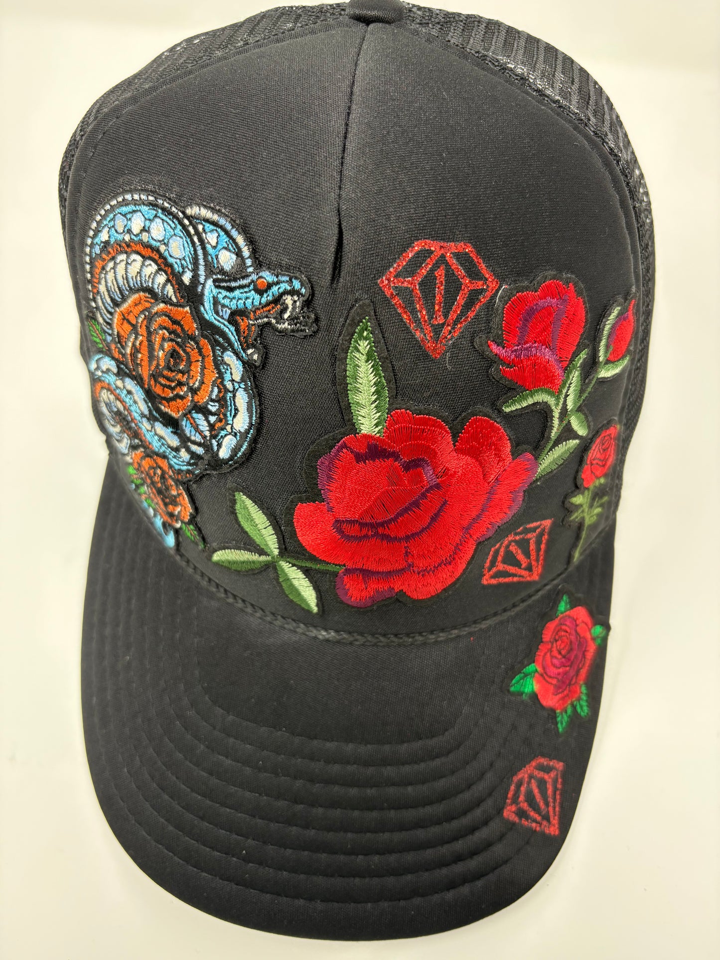 “Year of the snake” trucker hat