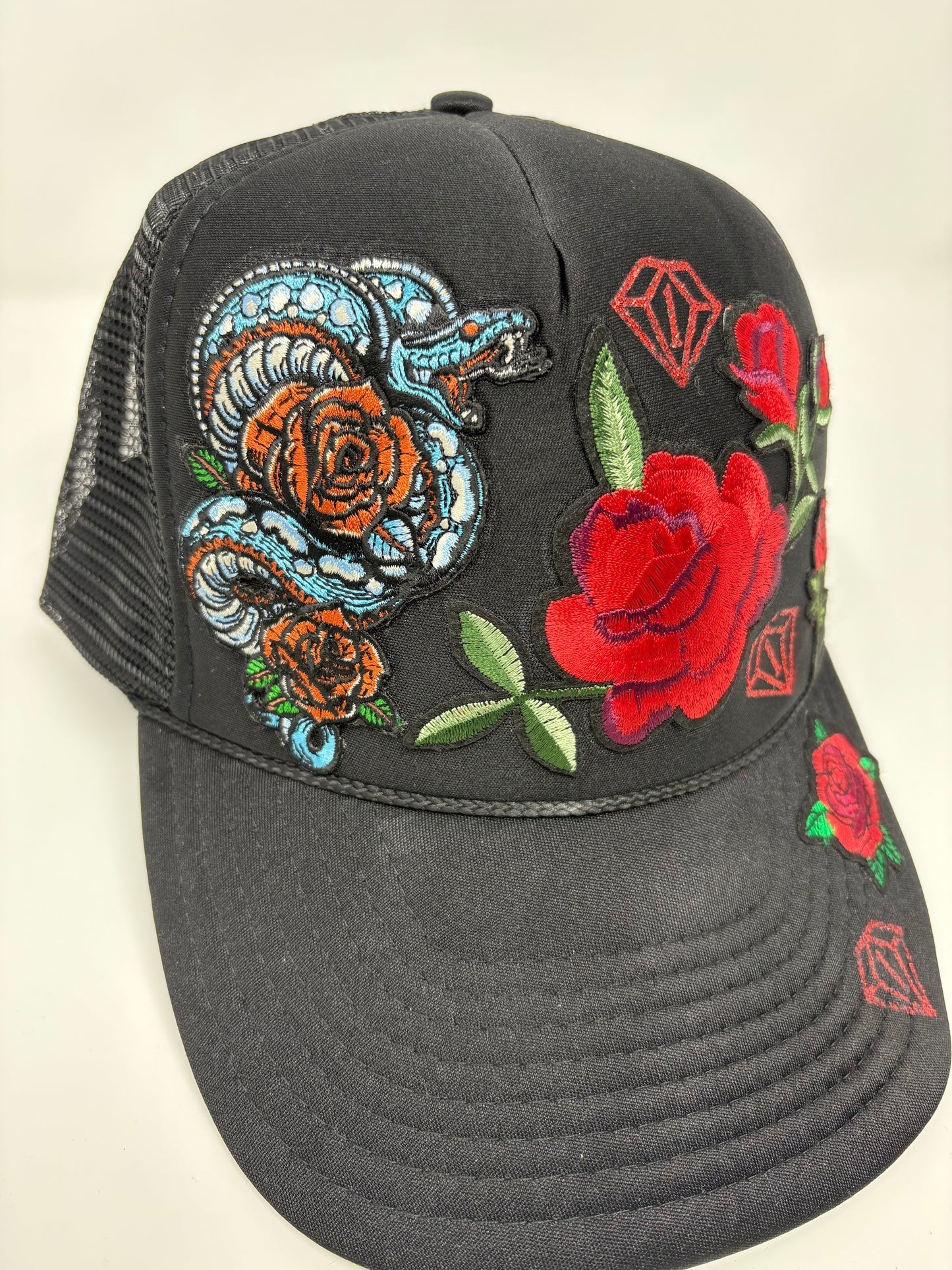 “Year of the snake” trucker hat