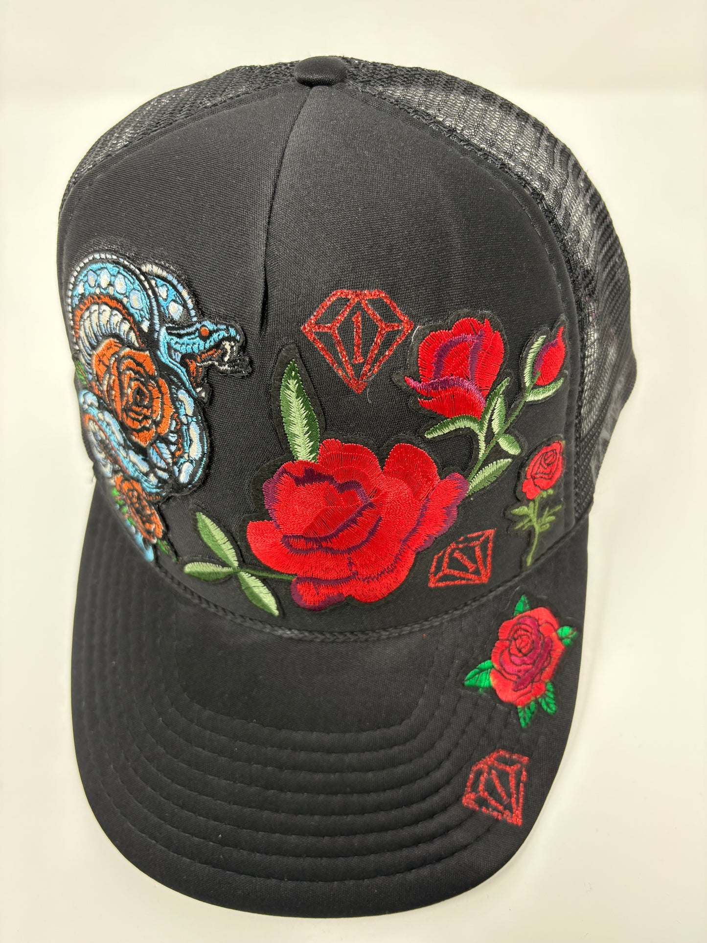“Year of the snake” trucker hat