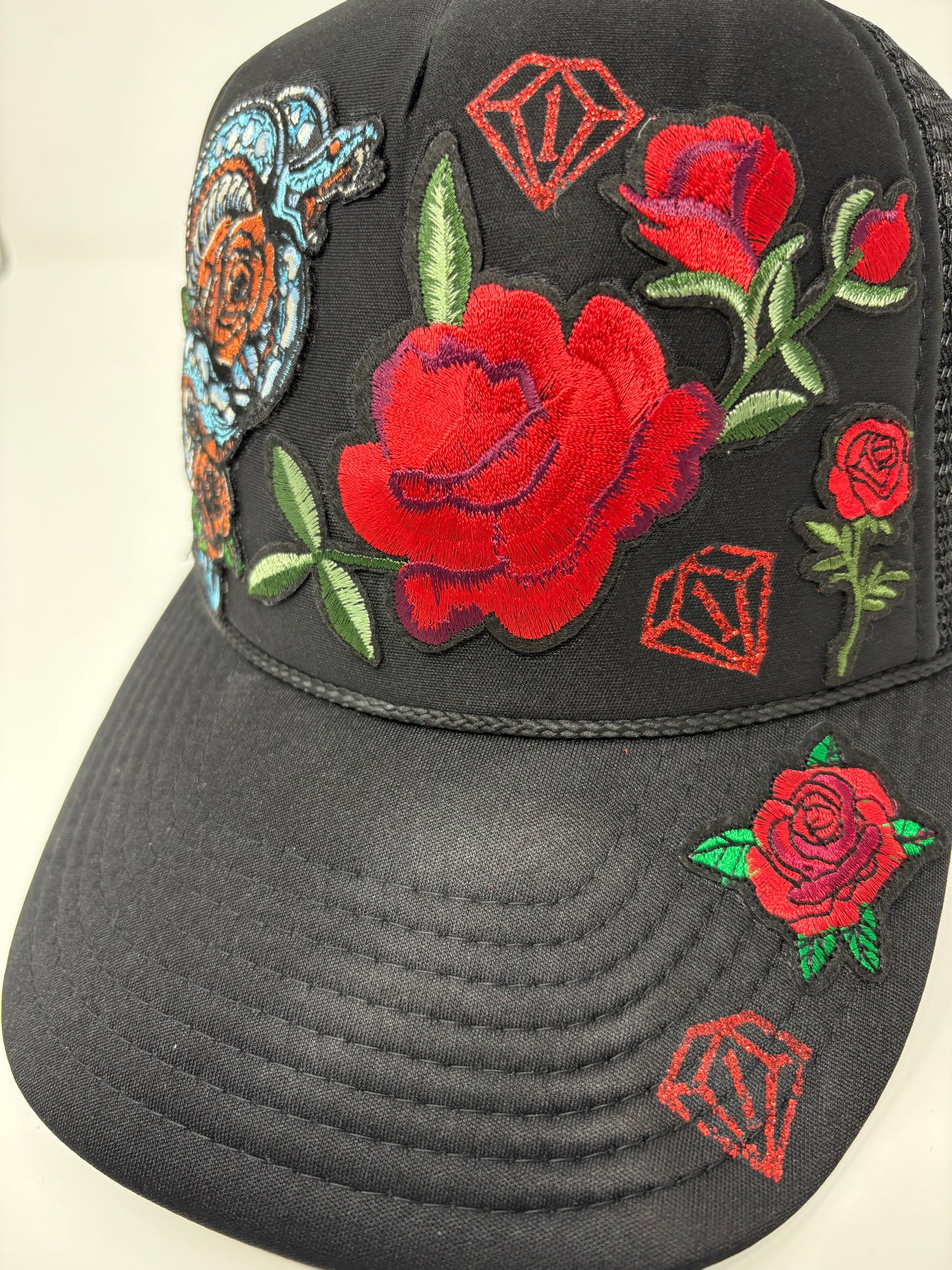 “Year of the snake” trucker hat