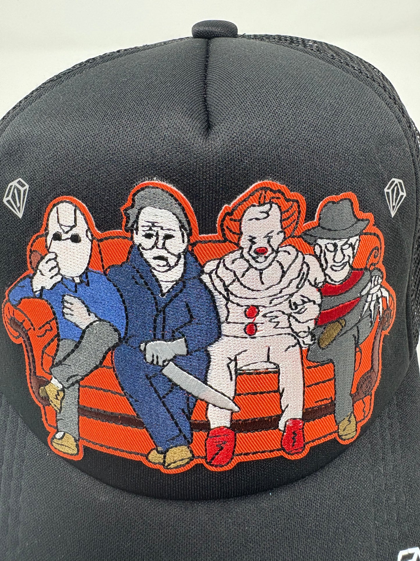 Scary Friends black trucker hat