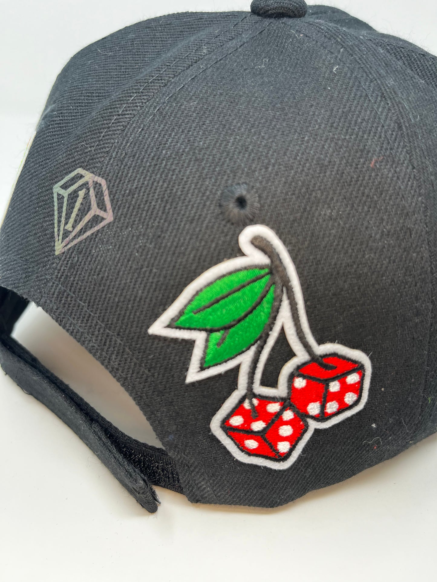 Cherry diamonds cap