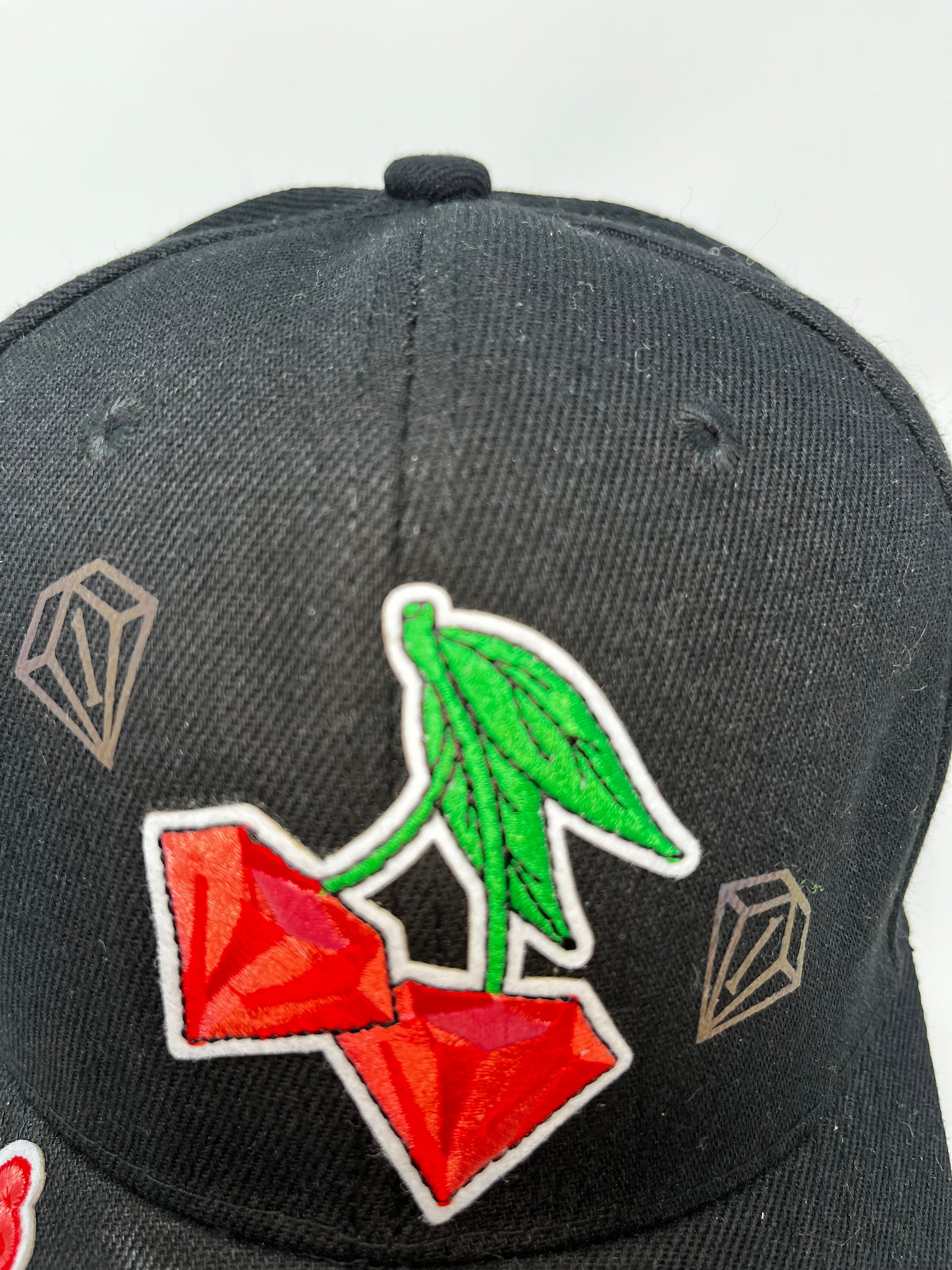 Cherry diamonds cap