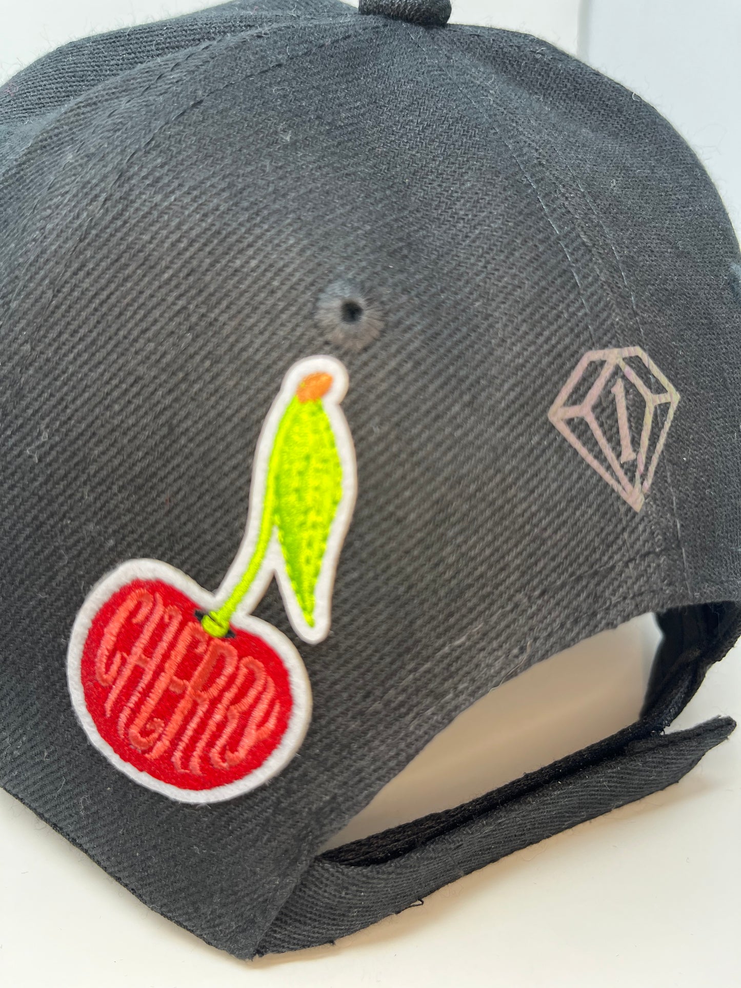 Cherry diamonds cap