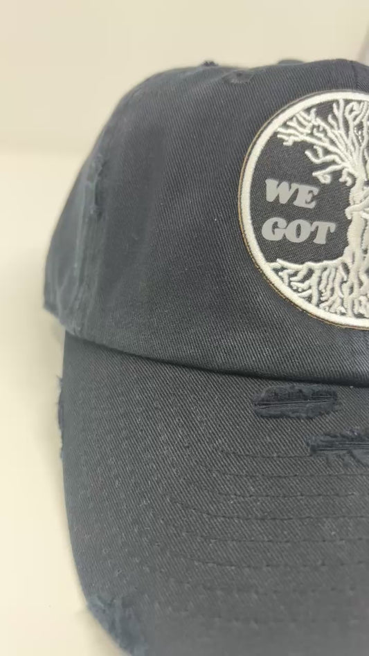 We got us distressed dad hat (blk)